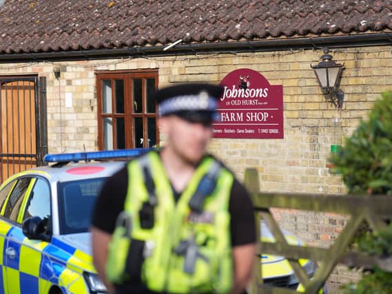 Police outside Johnsons of Old Hurst building