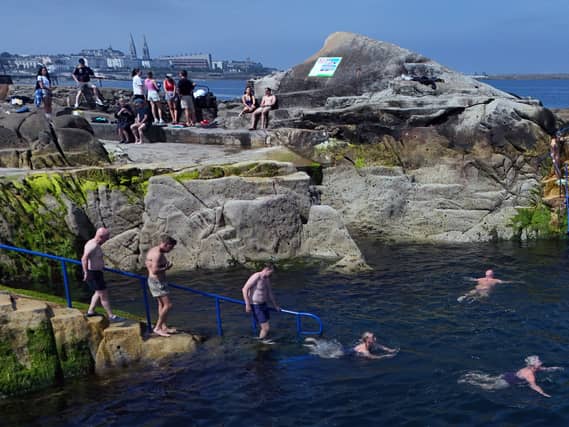 People cooling off at the Forty Foot