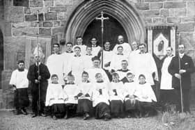 PICTURE FROM THE PAST: This charming archive picture from the early 1900s shows the choir of St Paul’s Church, Knowbury, near Ludlow, gathered outside the church more than a century ago. The banner on the left bears the church’s name, while the man standing at the centre carrying the cross has since been identified as John Crowe, who served as the church’s sexton for 32 years. The photograph was brought to life by Charles Elliott, who recognised his grandfather among those pictured. Do you have memories or family connections to Knowbury Church? We’d love to hear from you.