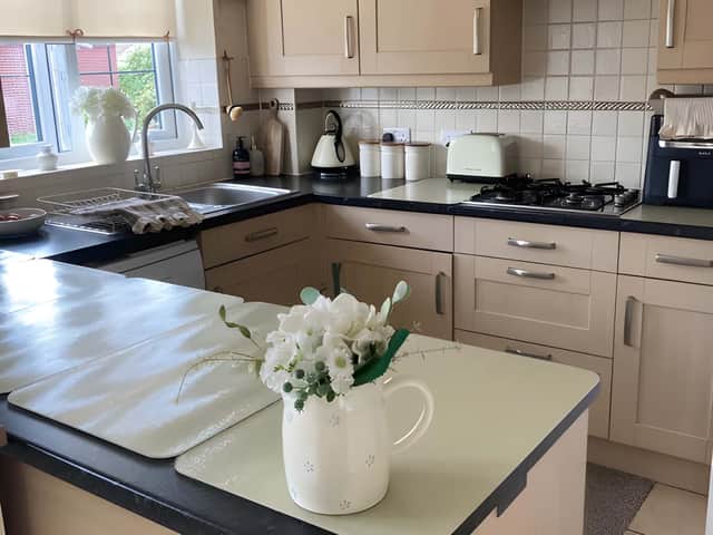 The spacious kitchen and breakfast room forms the social heart of the home with flexible living space nearby.