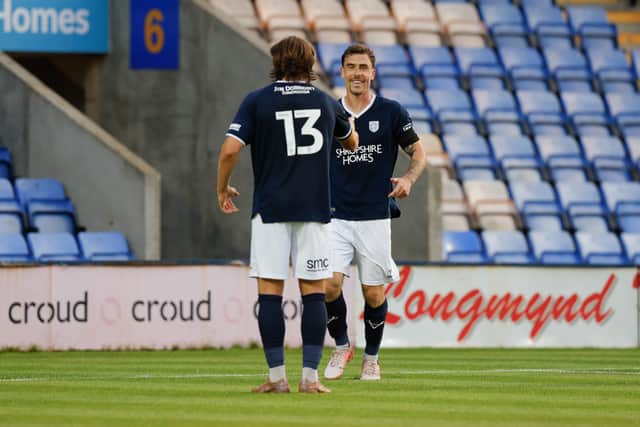 Josh Ruffels celebrates scoring foR Shrewsbury Town 