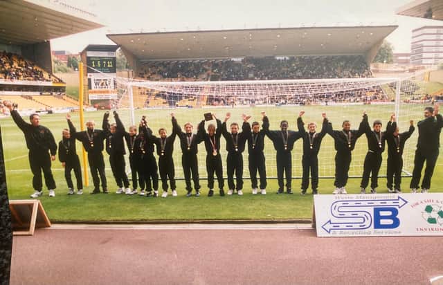 Taking the applause of the North Bank on their first game back at Molineux
