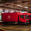 Royal Mail delivery vans parked up inside the Whitechapel delivery office (Victoria Jones/PA)