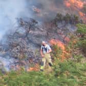 Firefighters at the wildfire on Hanter Hill near Kington on Thursday afternoon. They have now left the scene