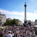 People take part in the London Trans+ Pride march in central London