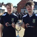A trophy, but not the real one – vice-captains Jordon Millman and (right) Luke Morris after the away leg in Wales