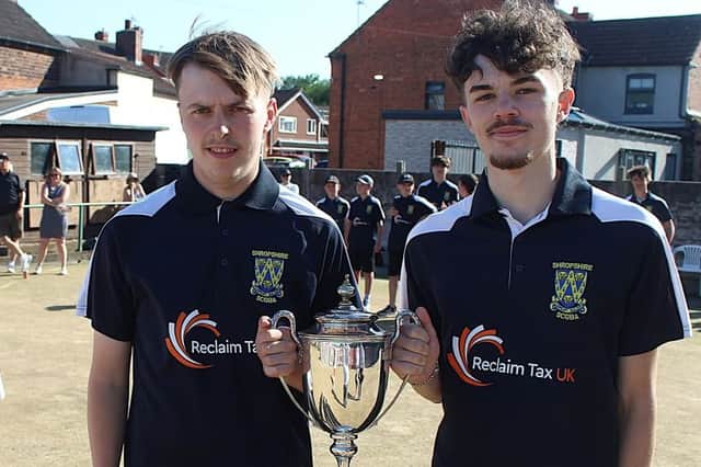 A trophy, but not the real one – vice-captains Jordon Millman and (right) Luke Morris after the away leg in Wales