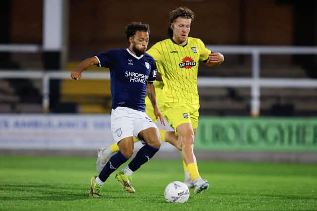 Jeval Thompson Mckenzie (left) in action for Shrewsbury Town during pre-season