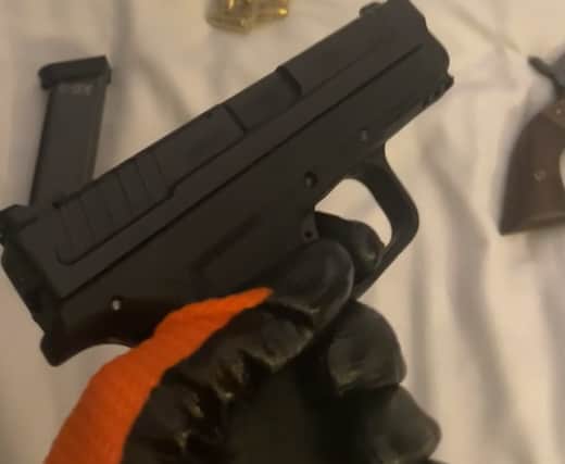 Johannes Natland wearing gloves whilst handling a gun. (Counter Terrorism Policing/PA)