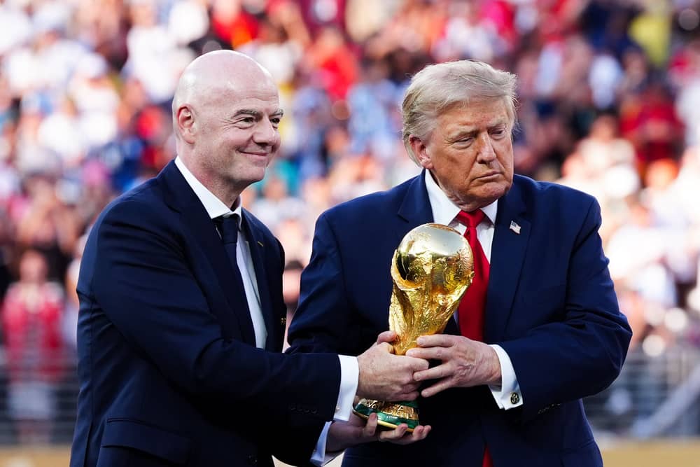 FIFA president Gianni Infantino and US president Donald Trump with the World Cup trophy
