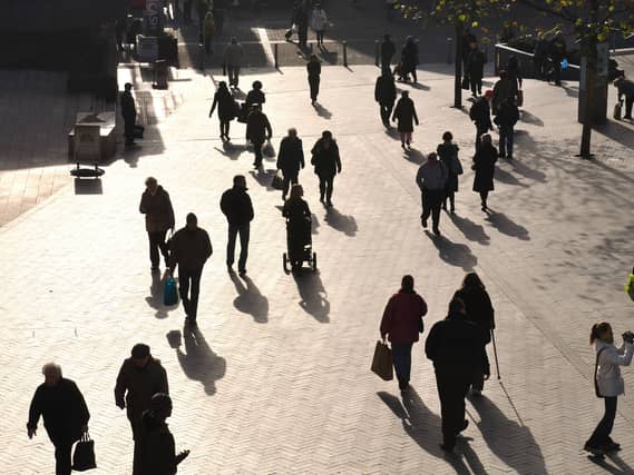 People walking through the Bullring area of Birmingham