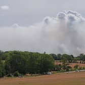 Smoke rises from a wildfire at Dunwich Heath, near Leiston, as major incident has been declared as firefighters battle a large heathland blaze