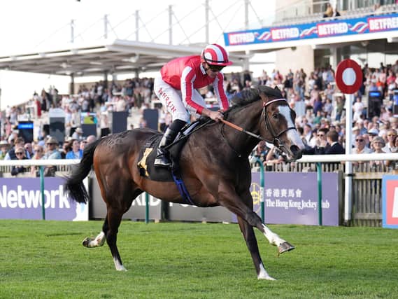 Saber Strike winning at Newmarket