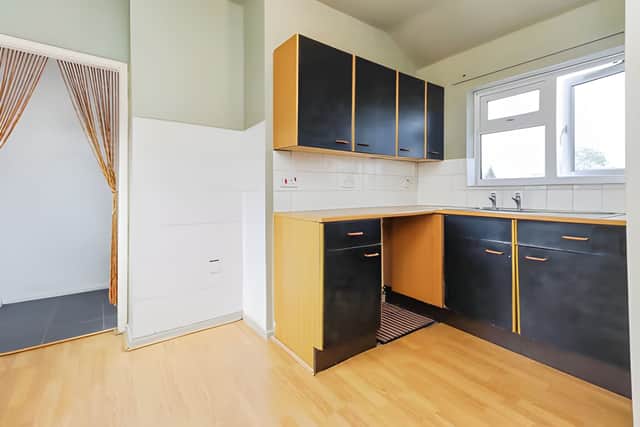Practical workspace and generous storage make the fitted kitchen well suited to everyday living.