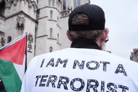 A protester outside the High Court