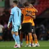 Fer Lopez gets a hug from Andre after scoring at Doncaster