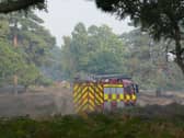 Firefighters tackle a wildfire at Dunwich Heath, near Leiston