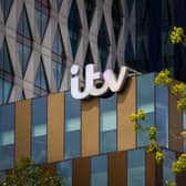 ITV logo on a building at MediaCity, Salford Quays, Greater Manchester.