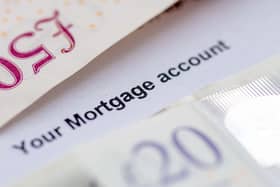 Close up of a mortgage account statement with bank notes