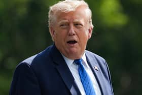 President Donald Trump departs following a cabinet meeting at Camp David,