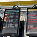 Departure board showing delays at Liverpool South Parkway station as an electricity supply failure at a communications centre caused major disruption to trains in the Midlands and north-west England