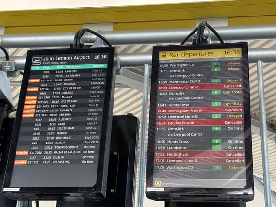 Departure board showing delays at Liverpool South Parkway station as an electricity supply failure at a communications centre caused major disruption to trains in the Midlands and north-west England