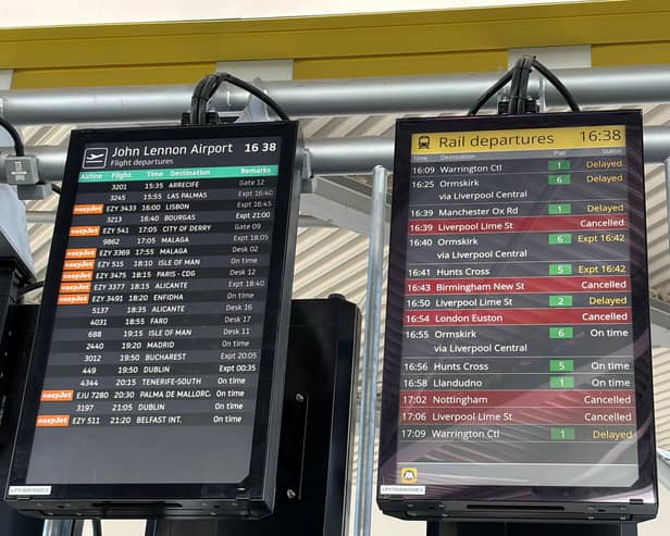 Departure board showing delays at Liverpool South Parkway station as an electricity supply failure at a communications centre caused major disruption to trains in the Midlands and north-west England