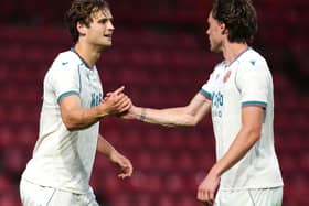 Aaron Pressley, left, celebrates scoring Walsall’s winner