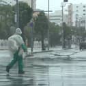 Someone walks in the rain