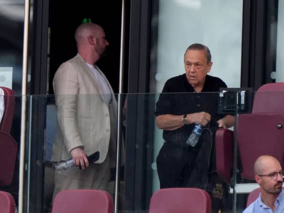 West Ham co-owner David Sullivan (right) sits in the stands