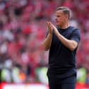 Leyton Orient manager Richie Wellens applauds