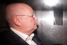 Peter Murrell in a prison van