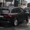 Garda vehicles arrive at the Central Criminal Court in Dublin