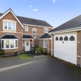 Positioned in an enviable corner position, the property boasts a double garage and generous driveway
