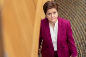 Former first minister Nicola Sturgeon leaves the chamber for the last time as an MSP