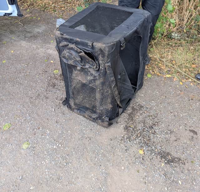 The container which the dog was weighted down in.