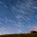 A meteor and star trails during the Perseid meteor shower seen from near Hawes in the Yorkshire Dales National Park
