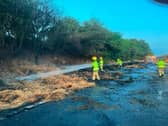 Firefighters tackling the blaze on the M54.