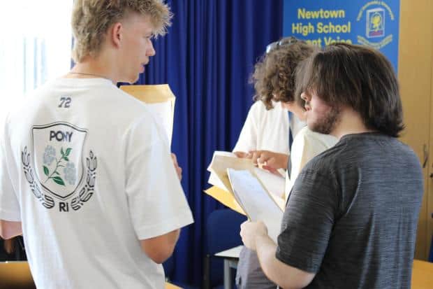 Newtown High School students looking at their results