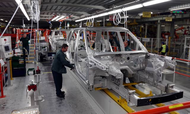 Range Rovers in production at the Jaguar Land Rover (JLR) plant Solihull (David Jones/Archive/PA)