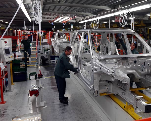 Range Rovers in production at the Jaguar Land Rover (JLR) plant Solihull (David Jones/Archive/PA)
