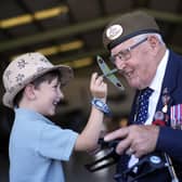 Second World War veteran Ivan Staines, 99, with his great-grandson Alfie Rose, five