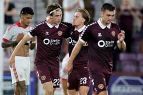 Hearts’ Tomas Magnusson (left) celebrates with Jordi Altena