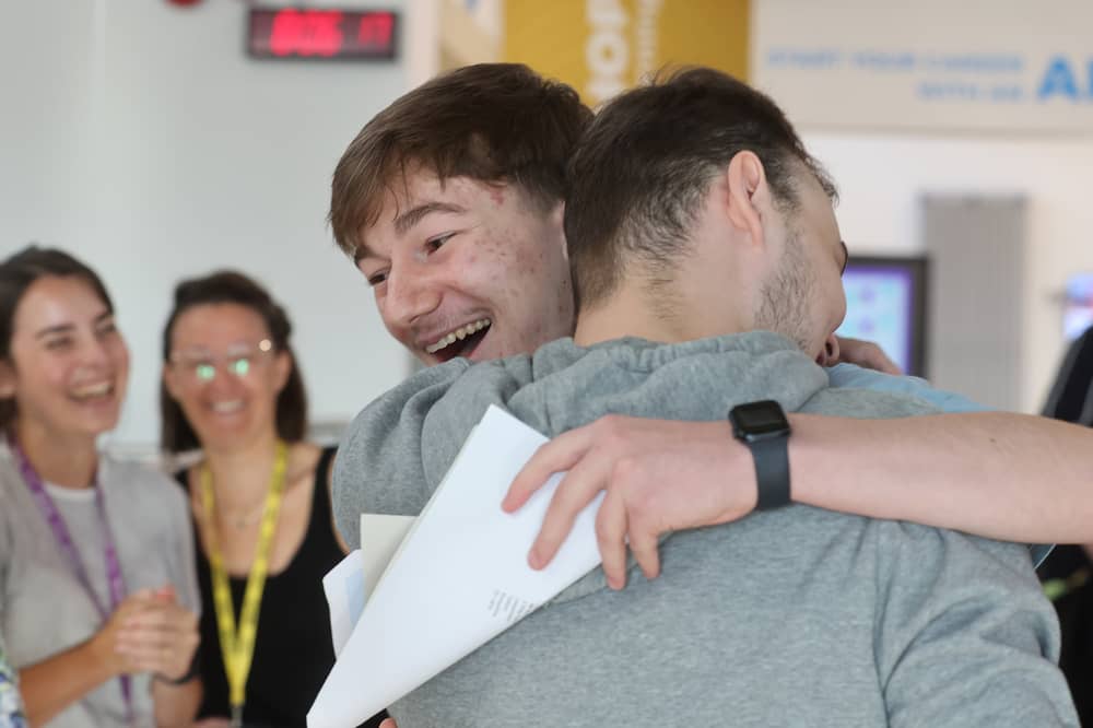 Bertie Witcomb (A*, A and B) and James Beach, celebrating their results at Telford College