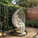 The SOLACE+CO Lola Egg Chair has a cocoon-like shape, cushioned seat and gentle swinging motion.