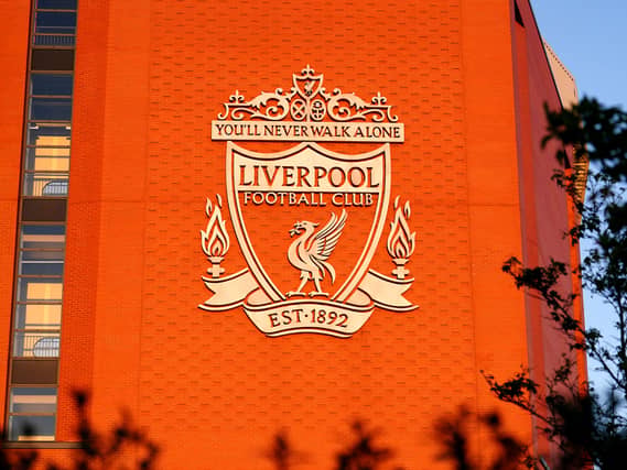 The Liverpool logo on an exterior wall at Anfield