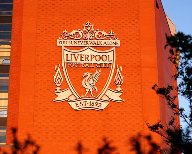 The Liverpool logo on an exterior wall at Anfield