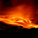 Eruptive activity continues on Mount Etna, where lava flows continue to descend on the slopes of the volcano, as seen from Serracozzo near Catania, Italy