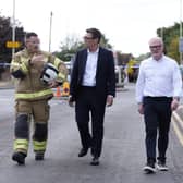 Prime Minister Andy Burnham and West Midlands Mayor Richard Parker (right) speaking to West Midlands Fire Service Chief fire officer Simon Tuhill in Stourbridge following a major wildfire near the town