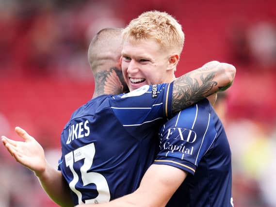 Josh Coburn (right) and Lyndon Dykes celebrate